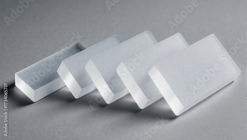 Lightweight aerogel transparent solid blocks arranged in a fan shape.