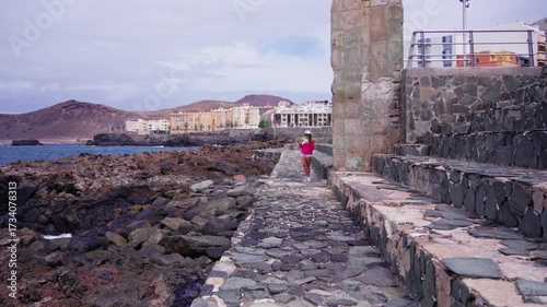 Scenic coastal walk along rocky shoreline in Tenerife