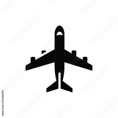 Silhouette of a commercial airplane viewed from above, with wings extended and tail fin, set against a plain