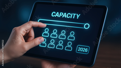 Capacity planning for business goal 2026 with tablet interface and user icons indicating team limit and digital monitoring