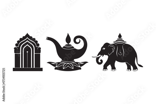 Traditional indian symbols of gateway lamp and decorated elephant