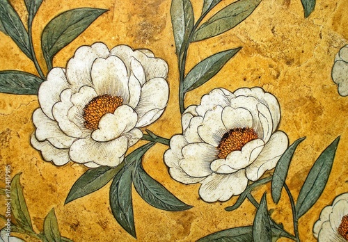 Delicate white peonies and intricate leaves adorn a textured, mustard-yellow surface, creating a beautiful floral design.