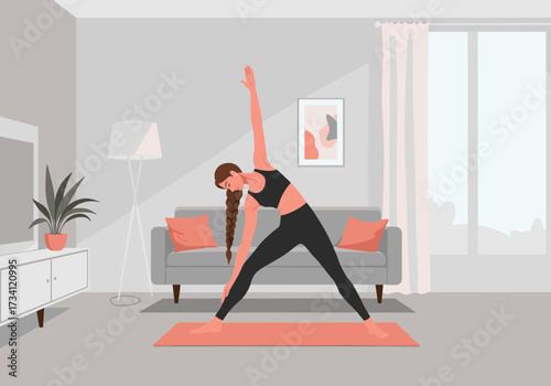 Yoga practice at home woman stretching in modern living room health and fitness relaxing environment side view