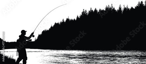 Silhouette of person fishing in lake with forest trees and mountain backdrop in peaceful outdoor nature scene.
