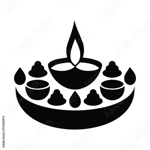 Traditional indian diya lamp with decorative elements lit for diwali festival celebration silhouette