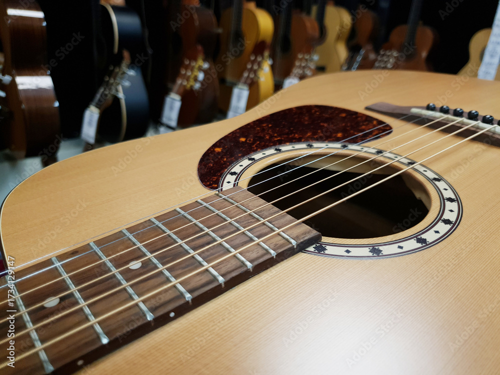 Fototapeta premium Acoustic guitars at a music store