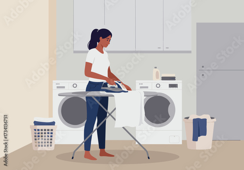 Laundry day woman ironing clothes at home in a modern laundry room environment