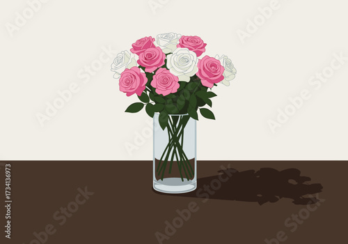 Elegant pink and white rose bouquet in a clear vase indoor setting floral still life soft lighting