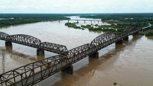 Wallpaper Mural Drone Shot of Bridges Spanning Flooded Riverbanks with Cinematic Deep Focus and HDR Steel Textures Torontodigital.ca