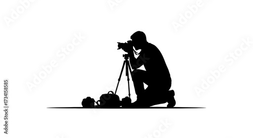 Professional photographer captures moment with camera on tripod surrounded by gear