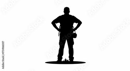 Confident photographer stands ready with camera bag, capturing moments with strong stance and purpose.