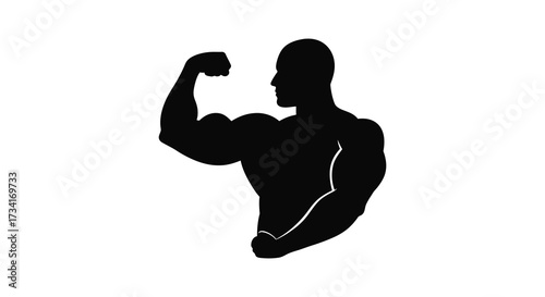 Muscular man flexing arm showing strength and fitness a dark silhouette