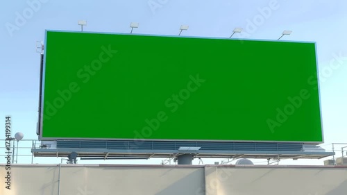 Billboard with Green Screen on Building against Blue Sky Chroma Key