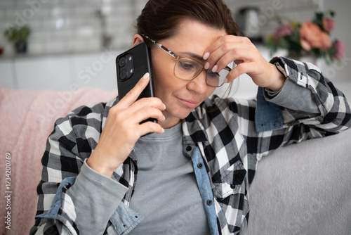 Woman Talking On The Phone Has An Unpleasant Conversation