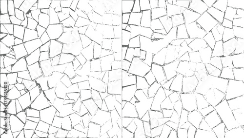 white surface with irregular dark lines forming a shattered pattern.