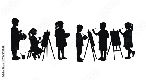 Children engaged in creative painting and drawing a striking silhouette