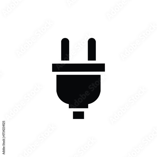 Close-up of a black electrical plug with two prongs and a grounding pin on a plain