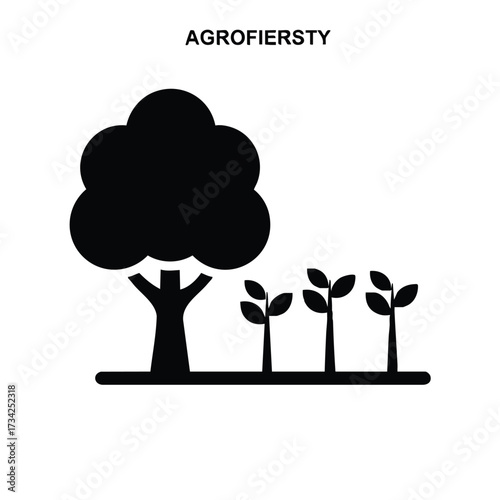 Young saplings growing beside a mature tree in a lush natural environment emphasizing growth and sustainability