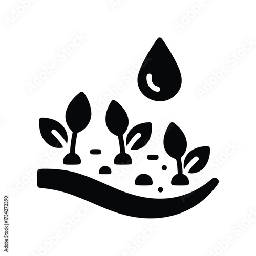 Young seedlings sprouting from soil with water droplets falling, symbolizing growth, nurturing, and early development in nature