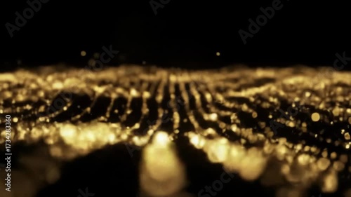 Abstract Golden Light Particles Moving in Wavy Pattern in Night Scene with Shimmering Effect