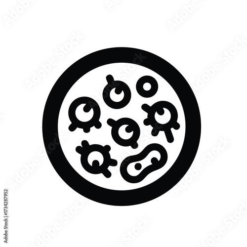 Close-up of a petri dish containing various bacteria colonies showing different shapes and sizes in a scientific laboratory setting