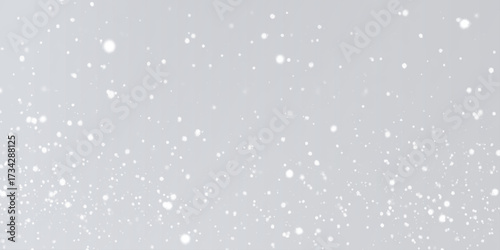 Winter background abstract with snow is dancing randomly on grey background, Softly falling delicate white sparkles and bokeh lights background with winter seasonal concept abstract background.