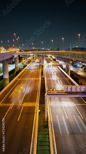 Multi-Lane Highway Traffic at Night (Vertical, Timelapse): Shotoko/Metropolitan Expressway Wangan/Bayshore Route in Tokyo, Japan
