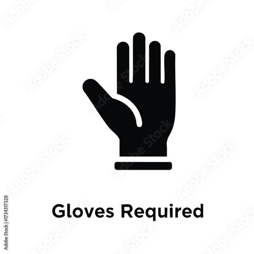 Close-up of a single black glove with a white cuff on a plain , emphasizing safety and protection in work or medical environments