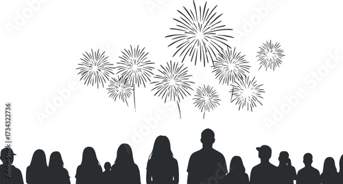 Silhouette of people watching a vibrant fireworks display against a dark sky..