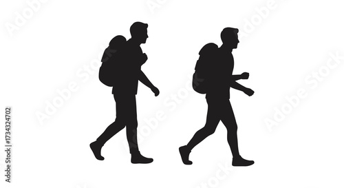 Two people walking with backpacks a striking black shape silhouette