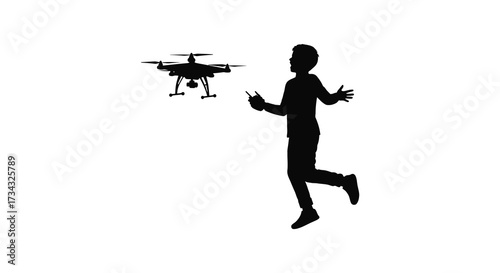 Boy operating a drone with outstretched arms a striking silhouette