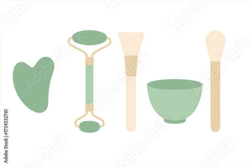 Skincare routine tools with jade roller, gua sha stone, mixing bowl, and applicator brushes for facial treatment