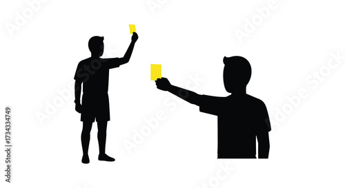 Referee showing a yellow card to a player striking image silhouette
