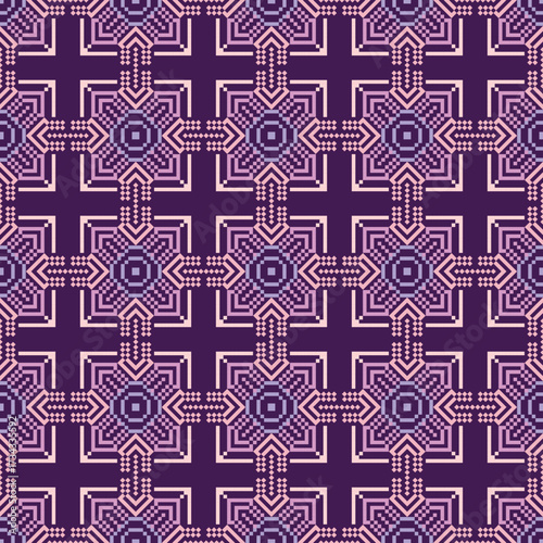 Pixel art textile pattern in purple and pink, arranged in symmetrical squares with geometric motifs.
