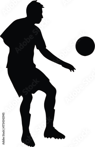 Black silhouette of a soccer player kicking a ball on a white background