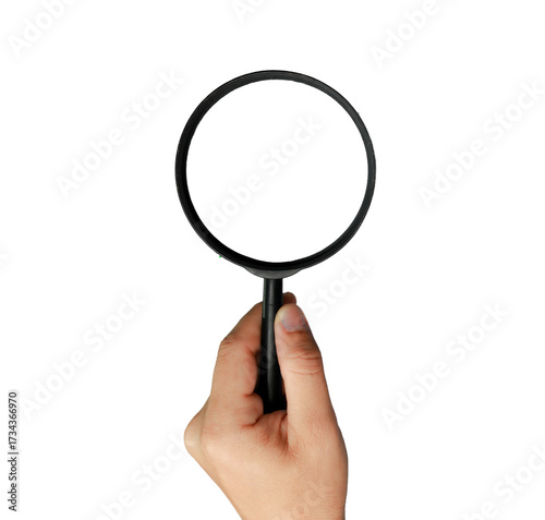Right hand holding a magnifying glass, gesture of looking, isolated on white background.