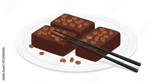 Delicious chocolate dessert served with chopsticks on a white plate.