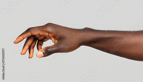 Elegant Black Hand Reaching Out Gently Offering Connection or Grasping Opportunity in a Clean Studio Setting