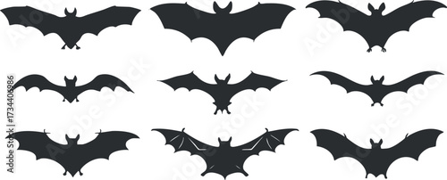 A collection of bat silhouettes in various flying poses suitable for Halloween and spooky designs..