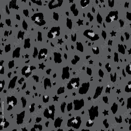 Seamless cheetah print pattern. Repeating vector print with black and light gray spots on a dark gray background. Apparel textile pattern.