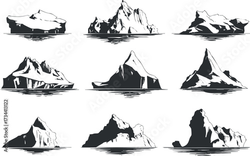 Collection of various icebergs and mountain silhouettes reflecting in water..