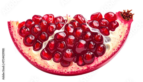Slice of juicy pomegranate with vibrant red arils, isolated