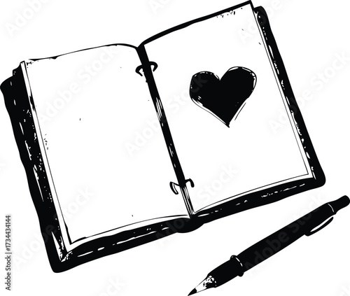 Vintage journal with heart and writing instruments
