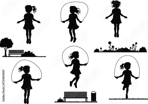 Silhouette of little girl skipping rope, children playing outdoors, jump rope exercise, park activity, healthy lifestyle, fun childhood moments