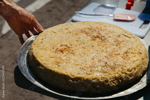 Quadro su tela Close-Up of a Giant Spanish Omelette in the Sun
