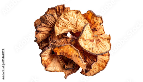 Pile of dried mushroom slices, tan/brown hues, detailed texture, black background