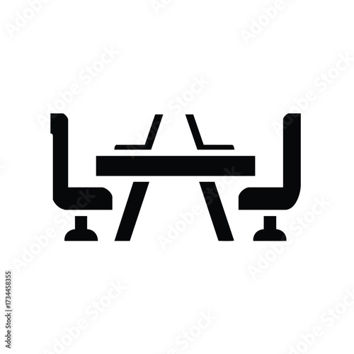 Modern conference room with a large table surrounded by ergonomic chairs in a professional setting