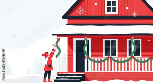 Festive cheer: woman decorating her red house with christmas garland in winter scene
