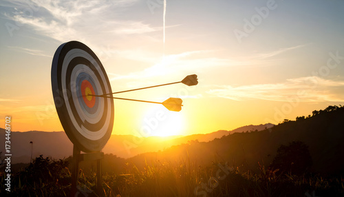 Arrows Hitting Target at Sunset with Golden Hour Light Over Field and Distant Hills