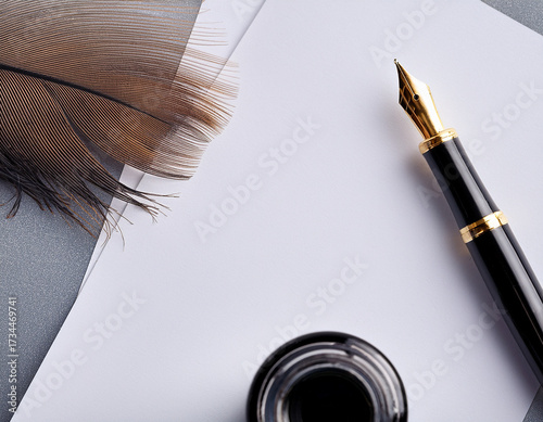 Elegant Writing Tools Featuring Quill Pen, Ink Bottle, and Blank Paper
